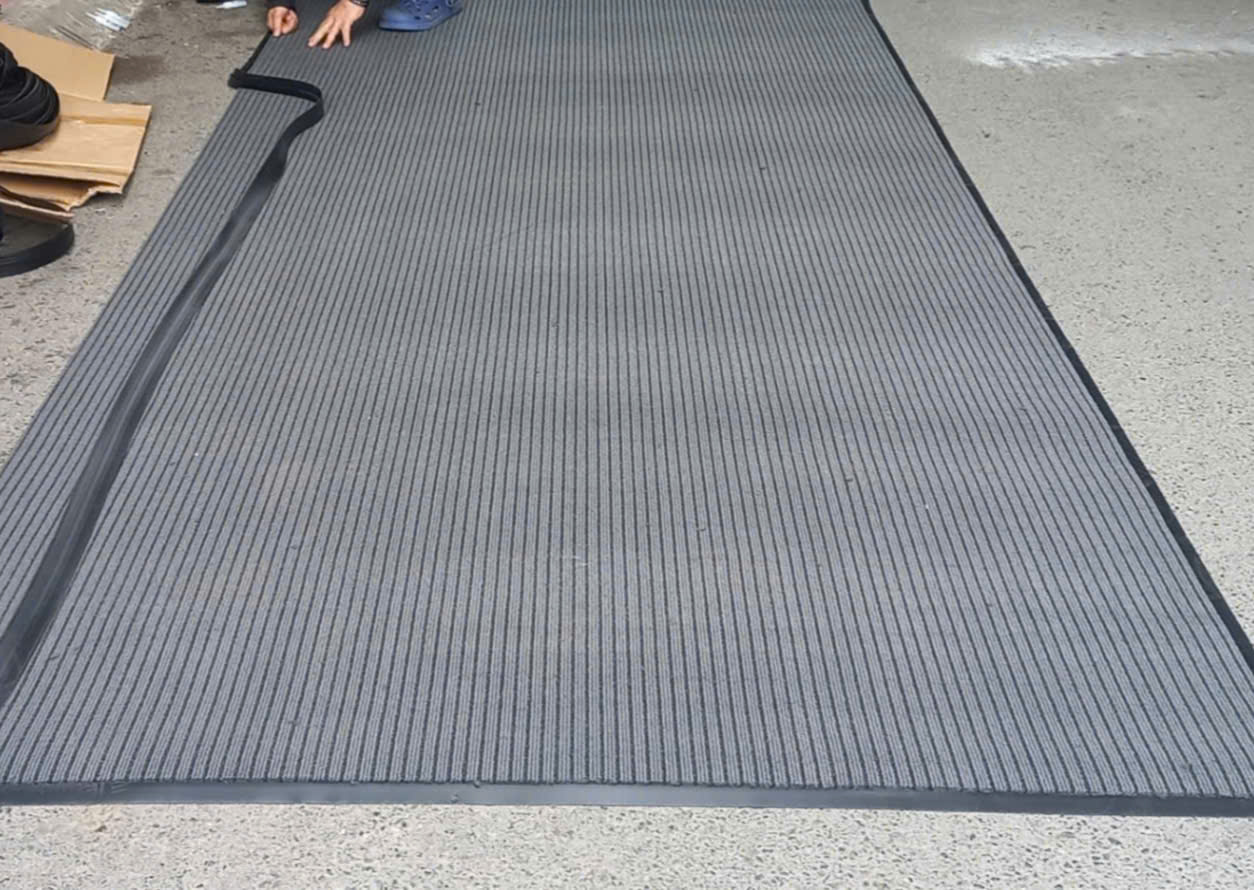 may bo viền thảm chùi chân